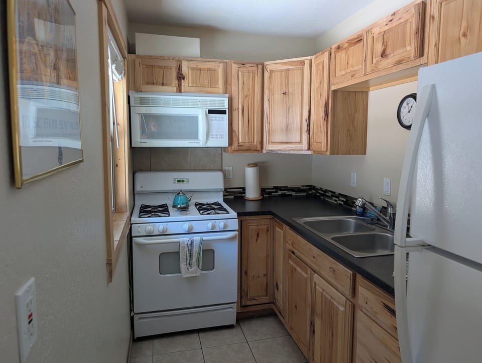 Gas range and oven, microwave over range. 