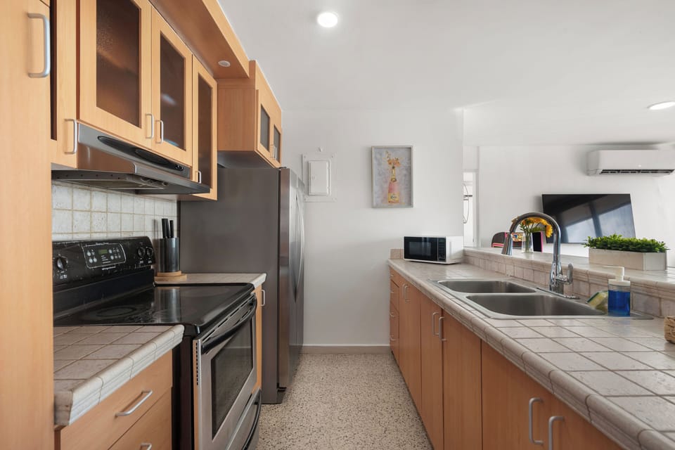 Modern appliances and ample counter space make meal preparation a breeze.

