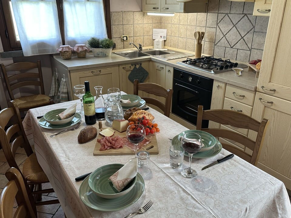 Furniture, Wood, Kitchen, Interior Design, Kitchen & Dining Room Table, Tableware, Countertop, Flooring, Kitchen Appliance, Dining Room