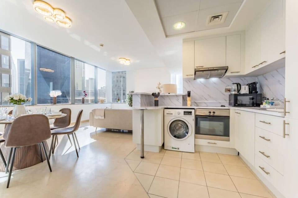 Dining & Kitchen: Modern design meets stunning city views for unforgettable meals!