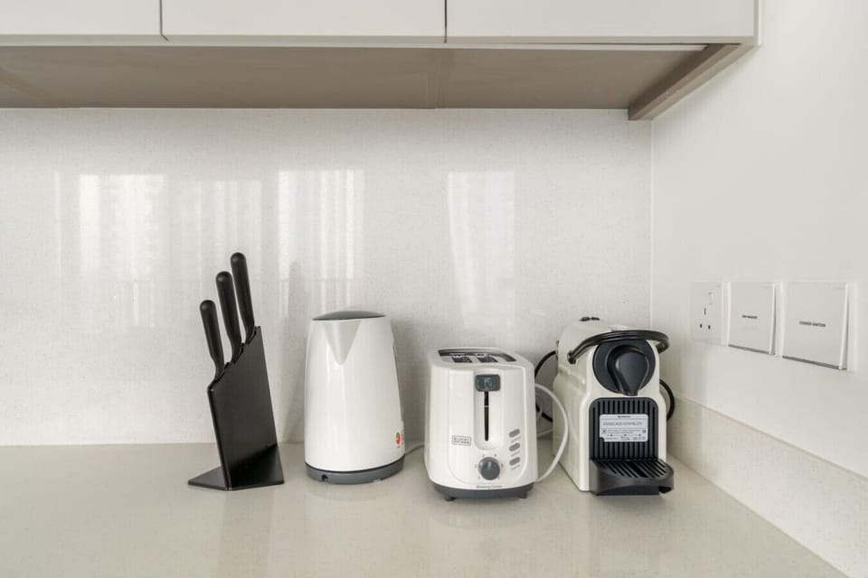 Kitchen Haven: Modern appliances await your culinary adventures in this stylish kitchen!