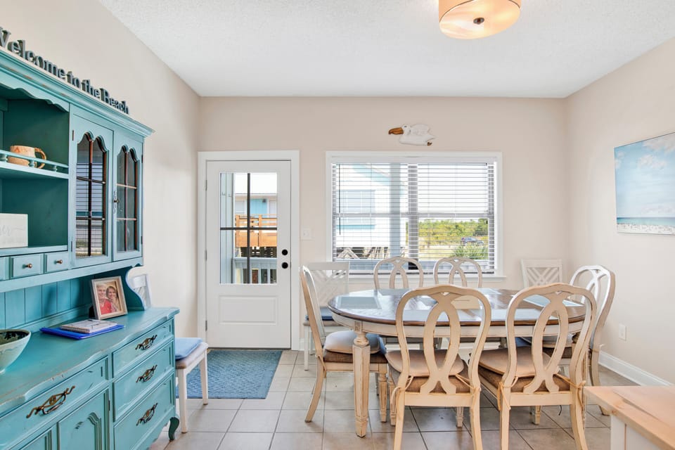 The dining/kitchen has balcony access