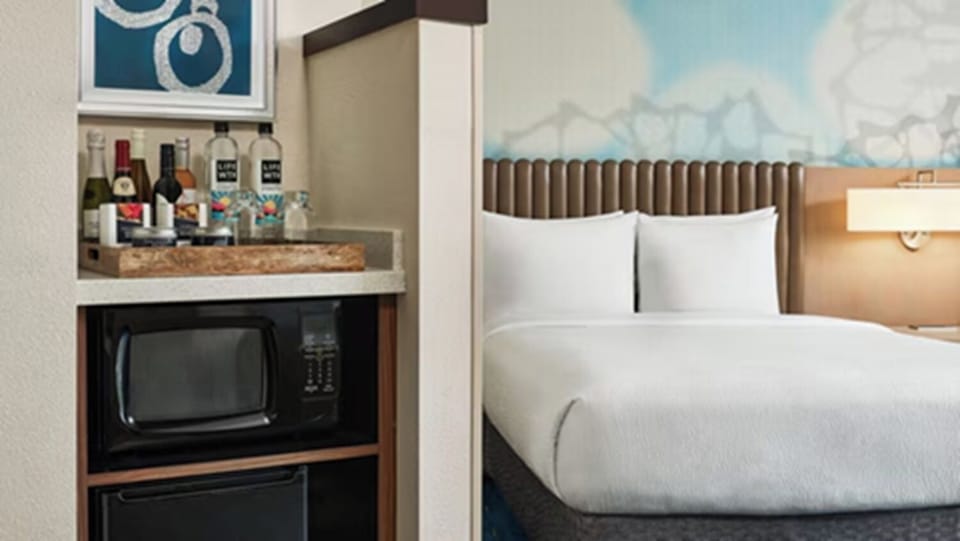 Unit with King bed. Exact unit will be assigned upon arrival. Views, colors, and decor may vary.