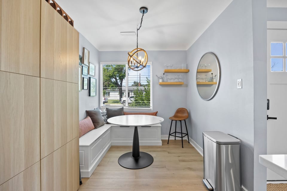 Dining nook and laptop-friendly workspace.