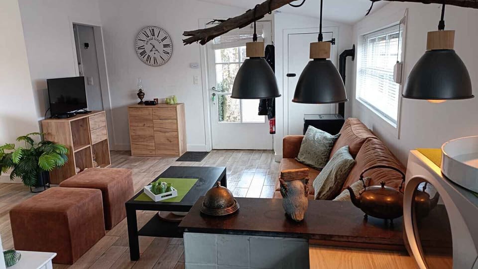 Living room of Holiday Park Klein Strand - Luxury Wooden Chalet