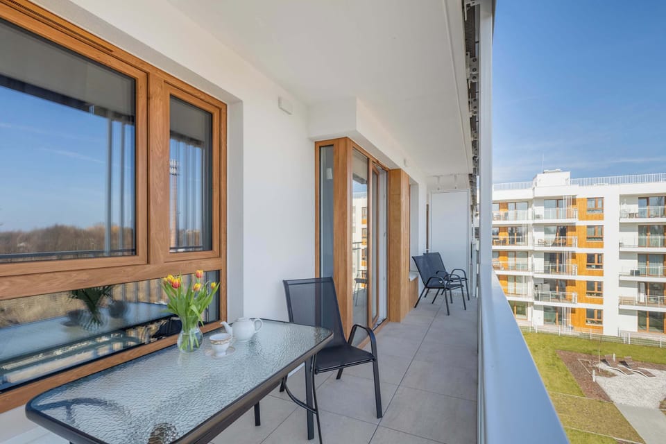 A private balcony with outdoor seating.
