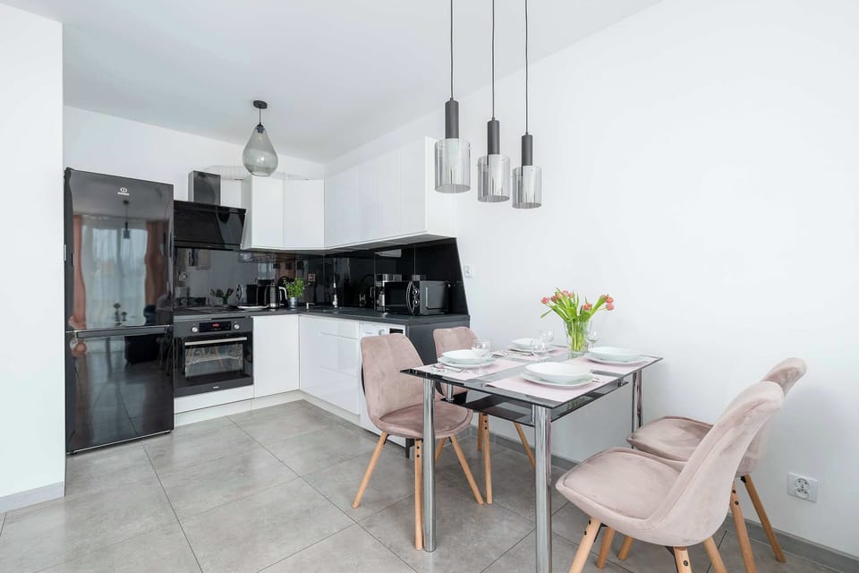 Cook and dine in style with the modern kitchenette and dining area.