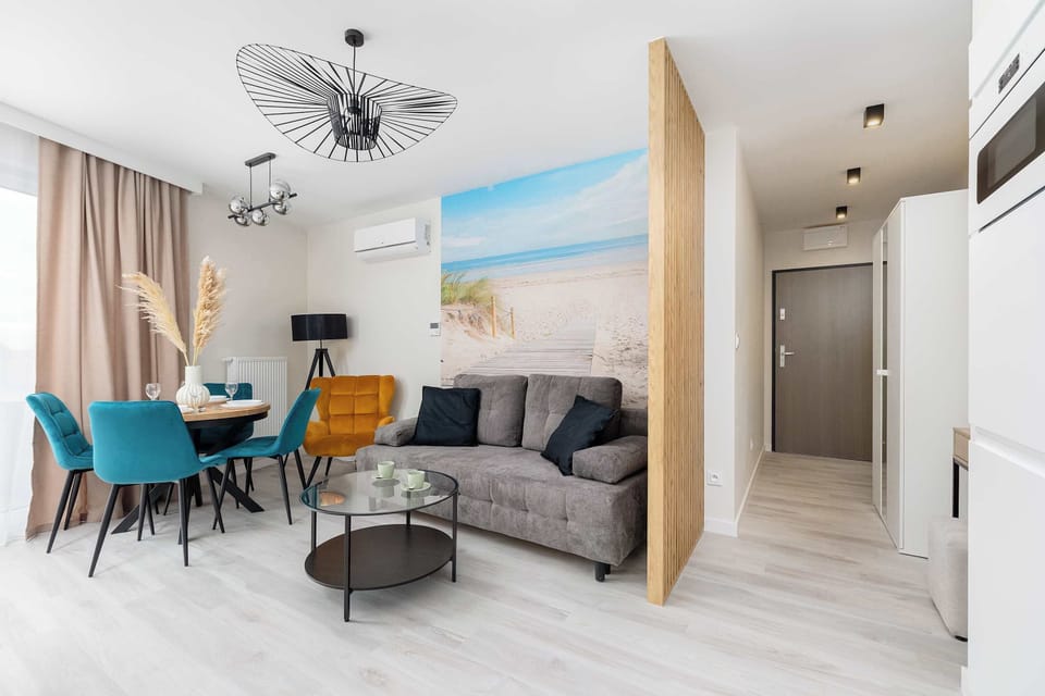 The living room's contemporary decor creates a chic and cozy environment. 
