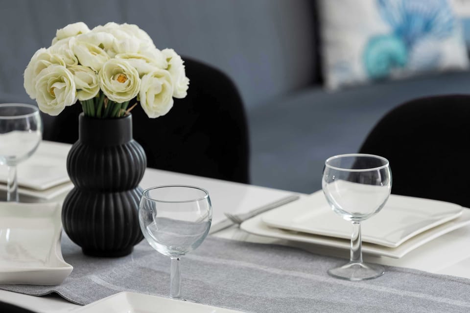 A close-up of the decorative flowers and tableware that will make any meal enjoyable.