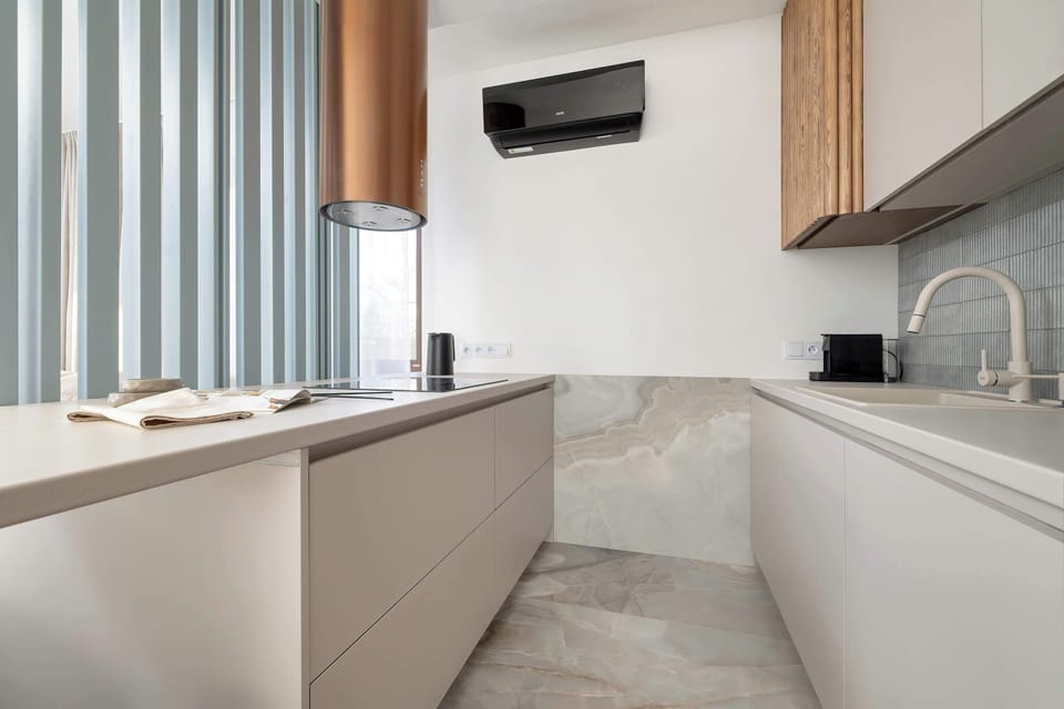 The fully equipped kitchenette includes everything you need for a home-cooked meal.