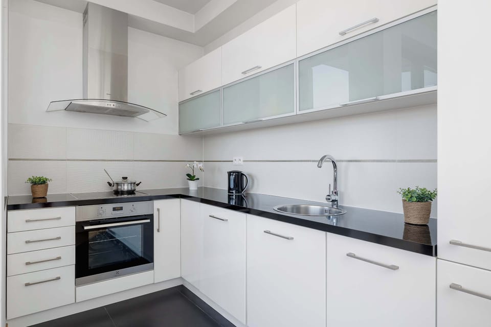 The fully equipped kitchenette includes everything you need for a home-cooked meal.