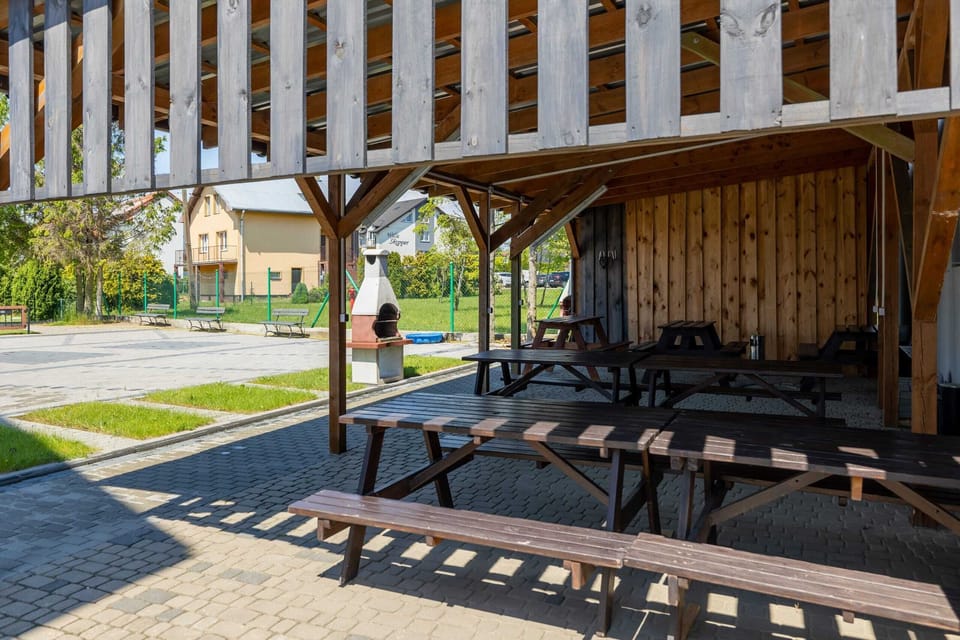 The furnished garden in the common area creates a serene environment for relaxation. 