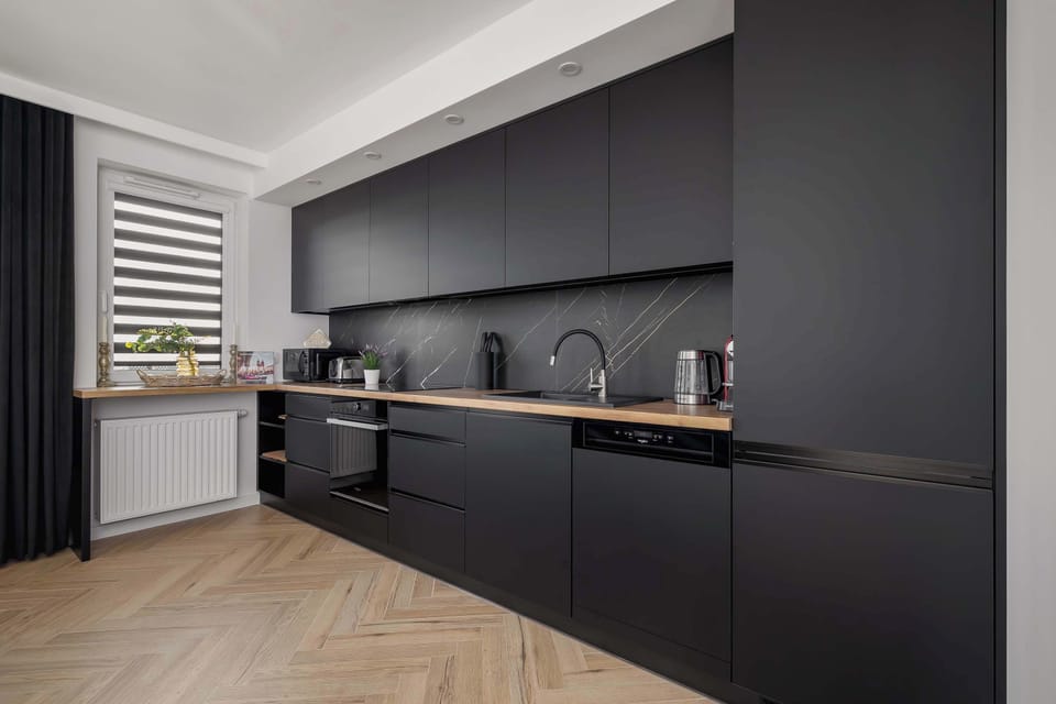 Cook and dine in style with the modern kitchenette and dining area.