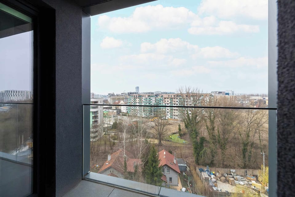 The balcony provides a perfect spot for enjoying the fresh air.