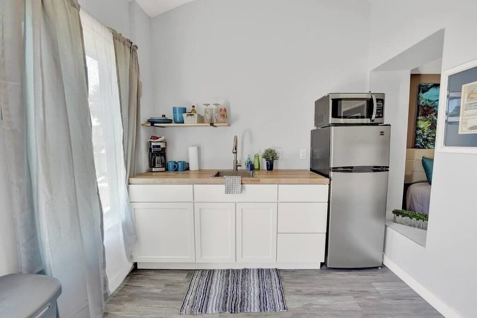 Kitchenette, complete with a fridge, freezer, microwave and a mini coffee bar!