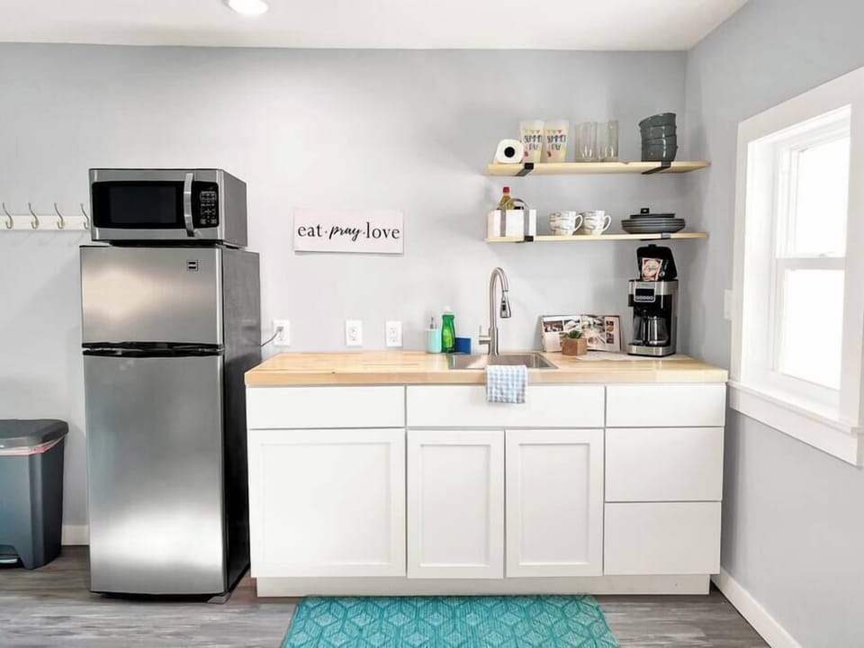 Kitchenette, complete with a fridge, freezer, microwave and a mini coffee bar!