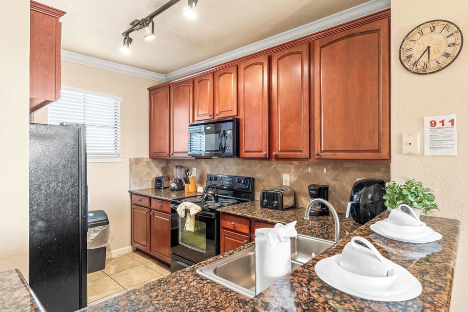 The open kitchen offers ample space & all the comforts of home​