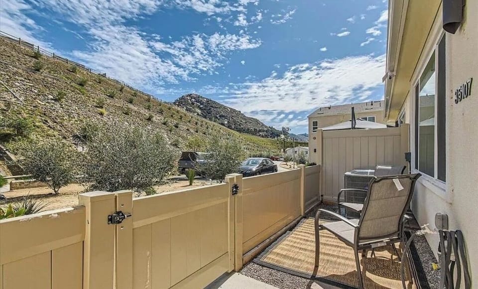 Outside patio/front yard with patio furniture
