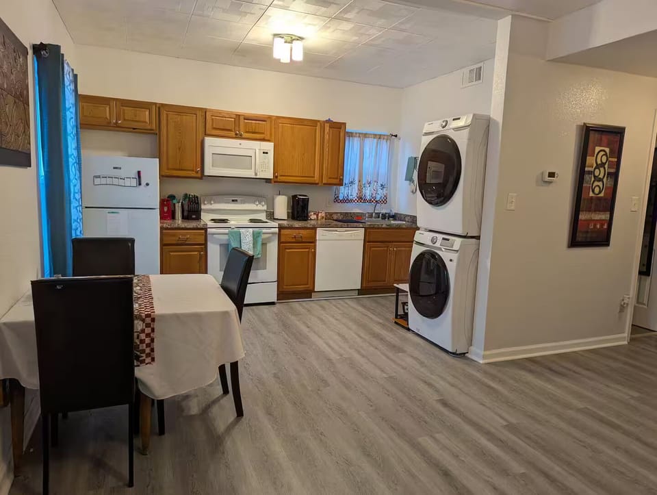 Full size washer/dryer.
Fridge, Oven, Dishwasher.
Seating for 3 dining table.