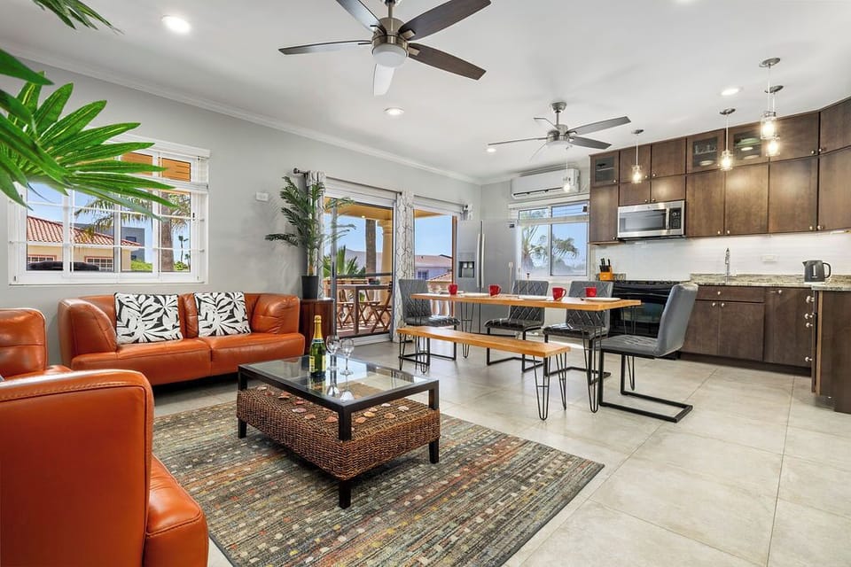 Unwind in style with our spacious open-concept living room, dining, and kitchen—perfect for entertaining, relaxing, or making lasting memories. Comfort meets modern design in every corner.