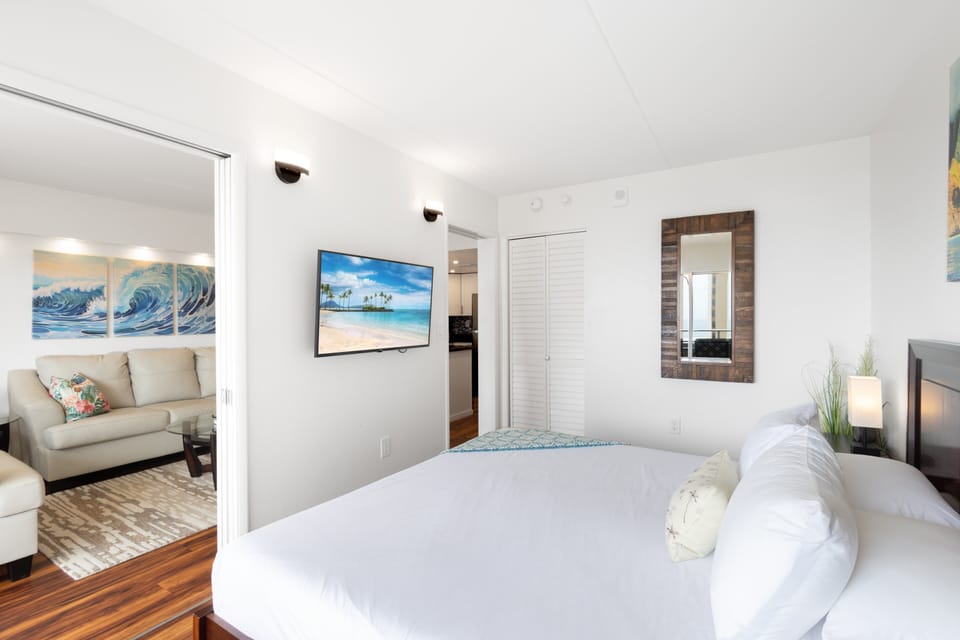 Pocket doors to close off the living room and an added TV - no fighting over what to watch!
