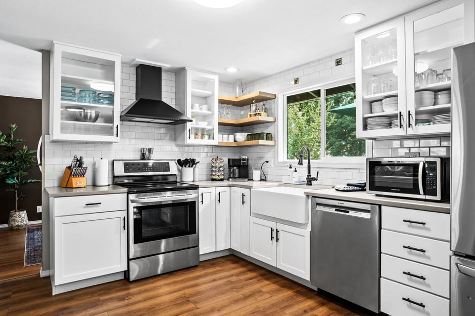 Fully stocked kitchen with coffee station.
