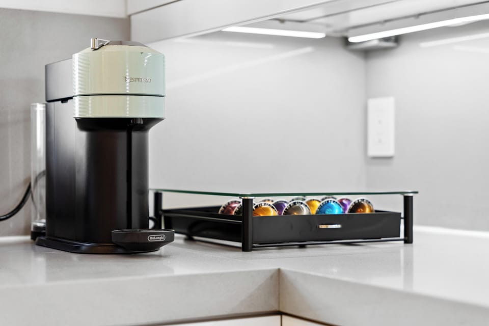 Enjoy quick morning coffee with the premium Nespresso machine.