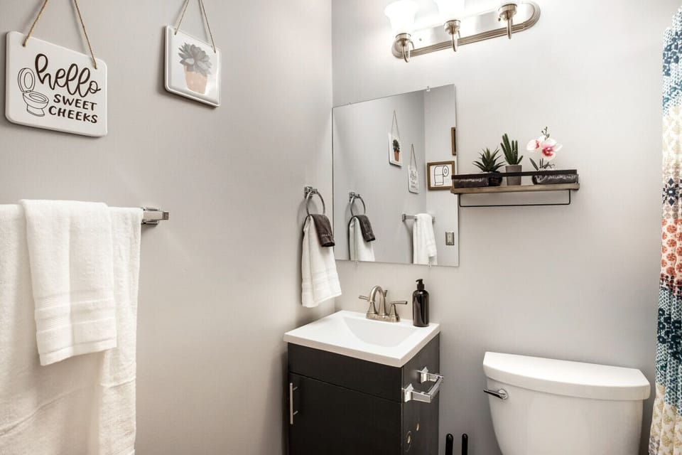Bright and refreshed bathroom space with all essential amenities.