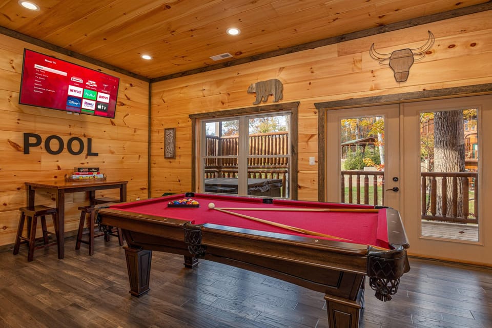 And just outside the bunk room is our game room—packed with fun for all ages! Whether it’s a quick round of pool, a Tic-Tac-Toe showdown, or arcade challenges, the good times are only steps away.