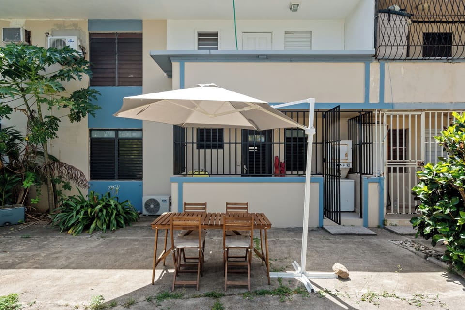 Al Fresco Dining Dreams: Enjoy delightful meals under the sun or stars on our charming outdoor patio, complete with comfortable seating and a large umbrella for shade.