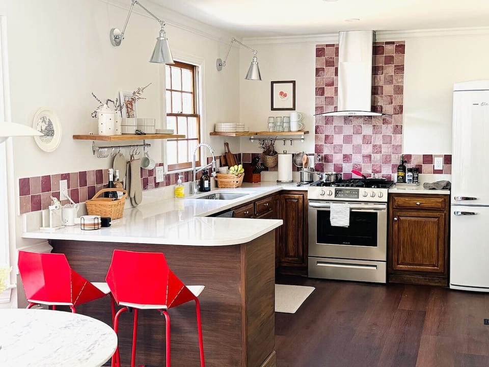 Full kitchen with cookware and appliances