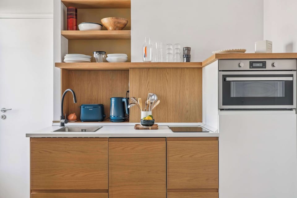 The kitchen is fully equipped to prepare a simple meal