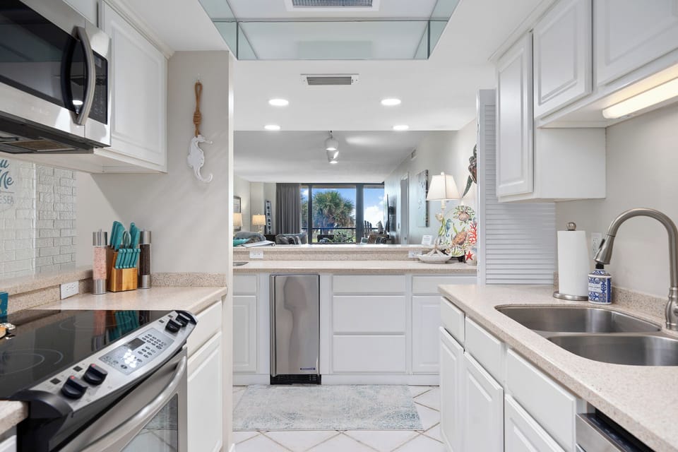 Fully equipped kitchen with modern appliances and gulf views! 
