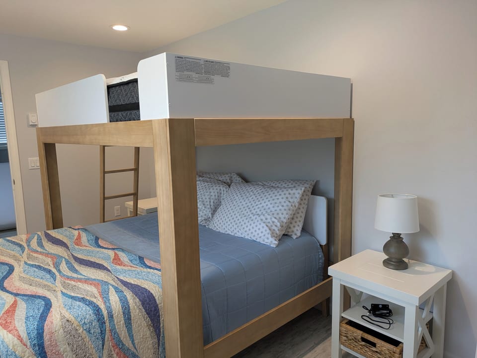 Cozy full-over-queen bunk bed.