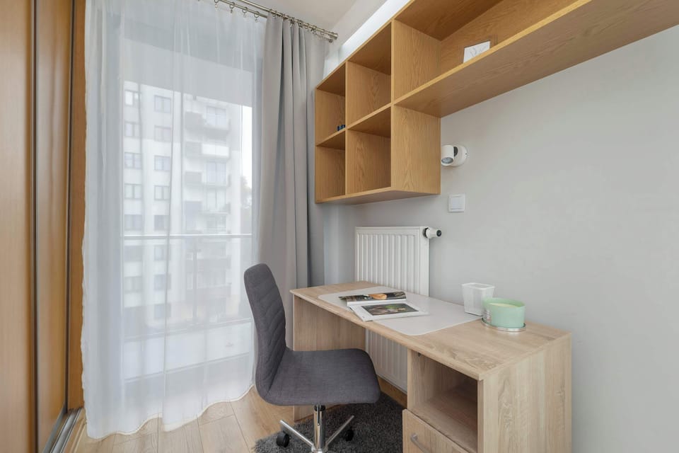 Desk with chair for remote work or study.
