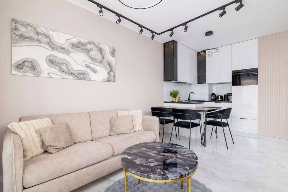 Elegant living room with kitchenette.