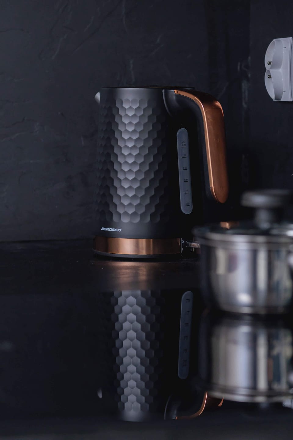 A modern electric kettle in the kitchen, blending functionality and sleek design. Perfect for preparing tea or coffee.