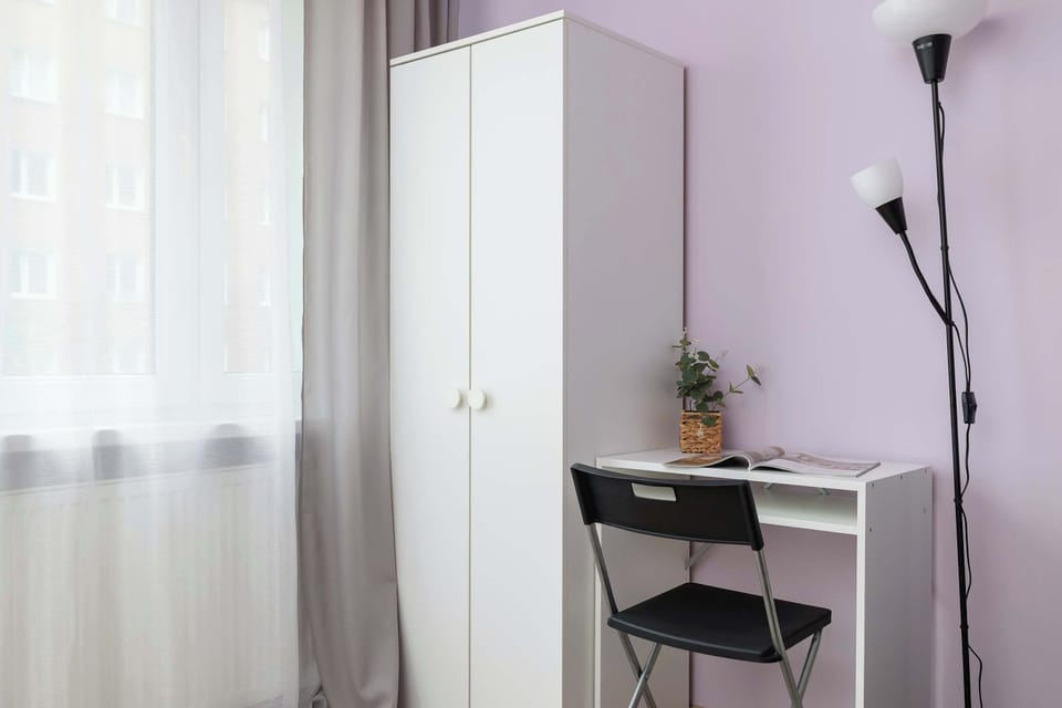 The bedroom has a closet and a desk, which will be a good place for remote work.