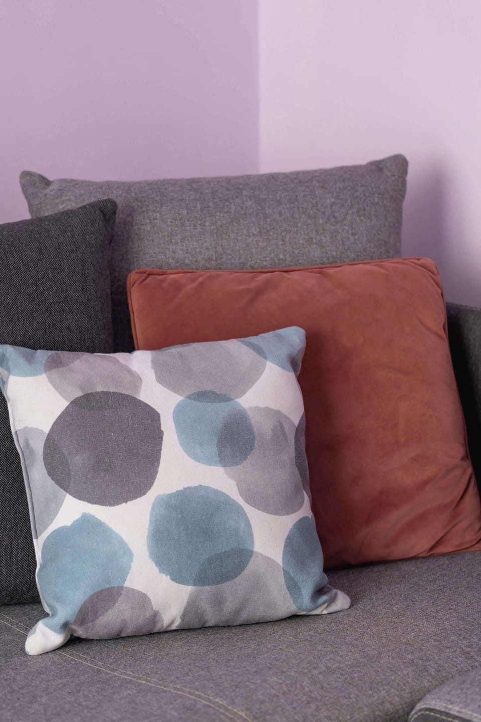 Close-up of the colorful pillows that add character to the interior.