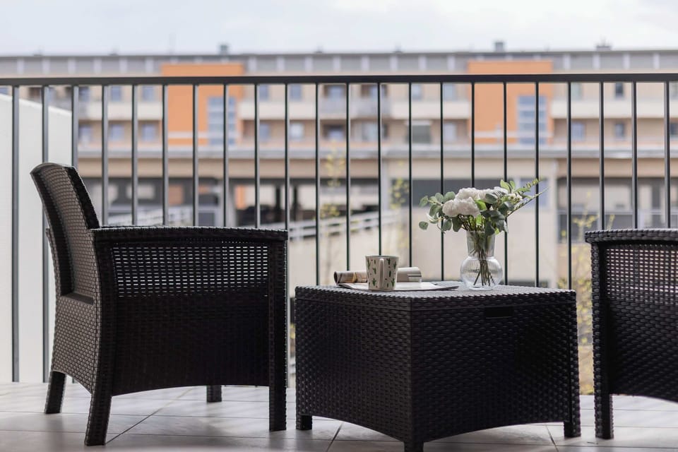 The balcony's peaceful ambiance is ideal for unwinding.