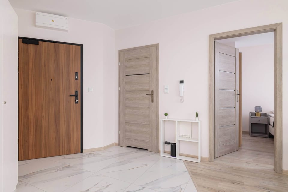 Stylish one bedroom apartment for four people with such appliances as washing machine, fan, and microwave.