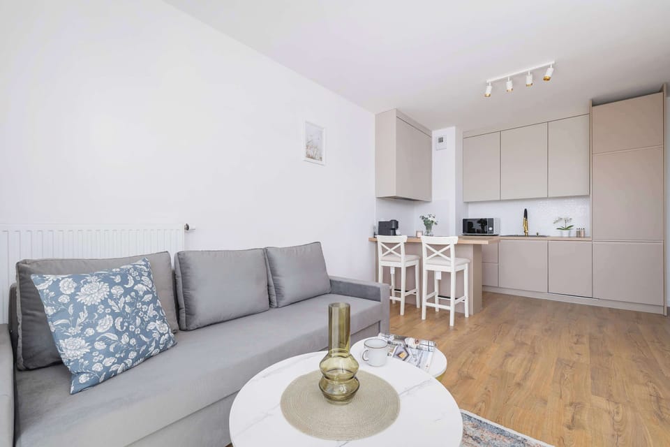 Enjoy your favorite shows on the flat-screen television in the elegant living area.