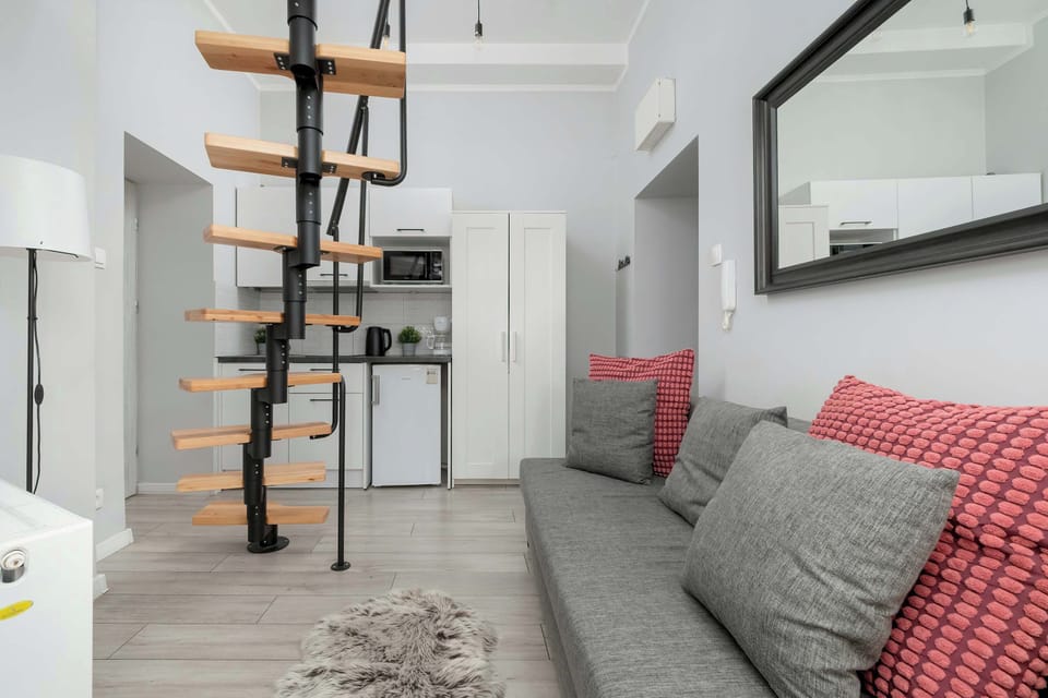 The studio has access to an equipped bathroom located in a separate room.