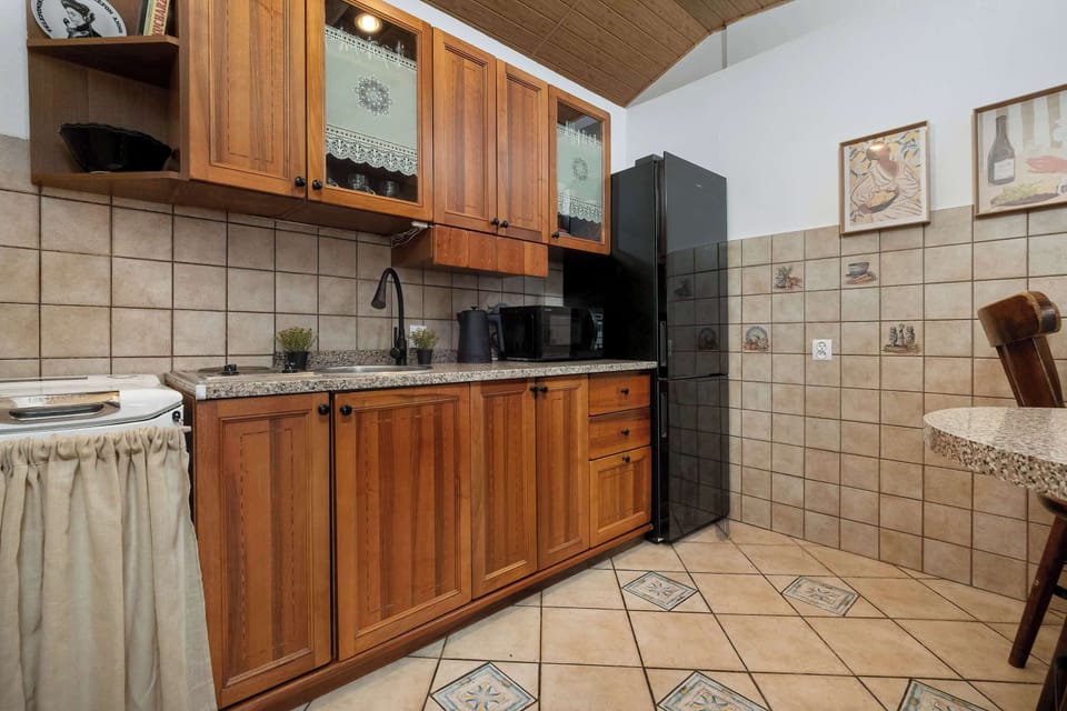 Another kitchen view focusing on the countertop and cooking area.
