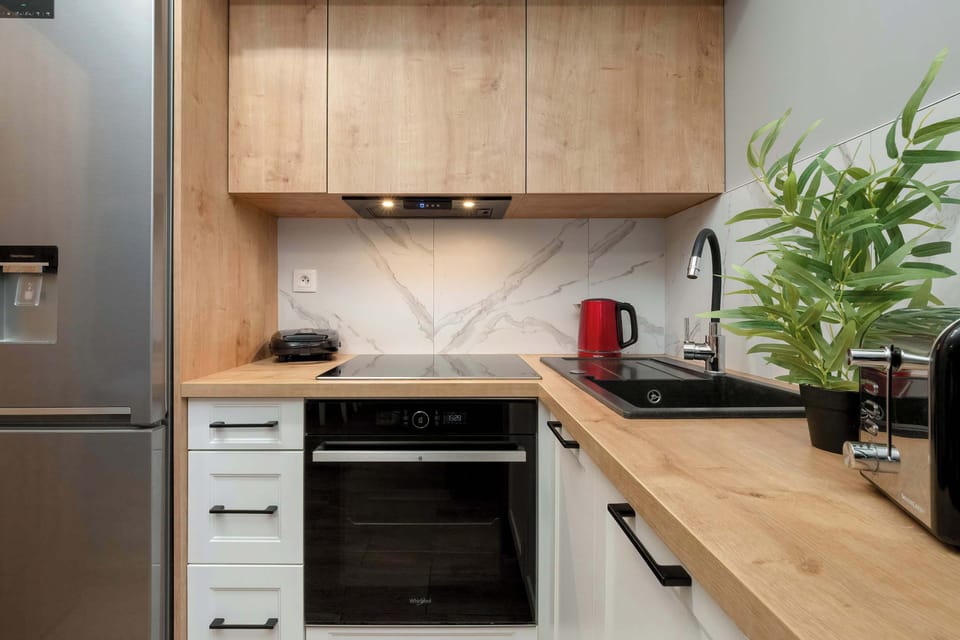 Cook and dine in style with the modern kitchenette and dining area.