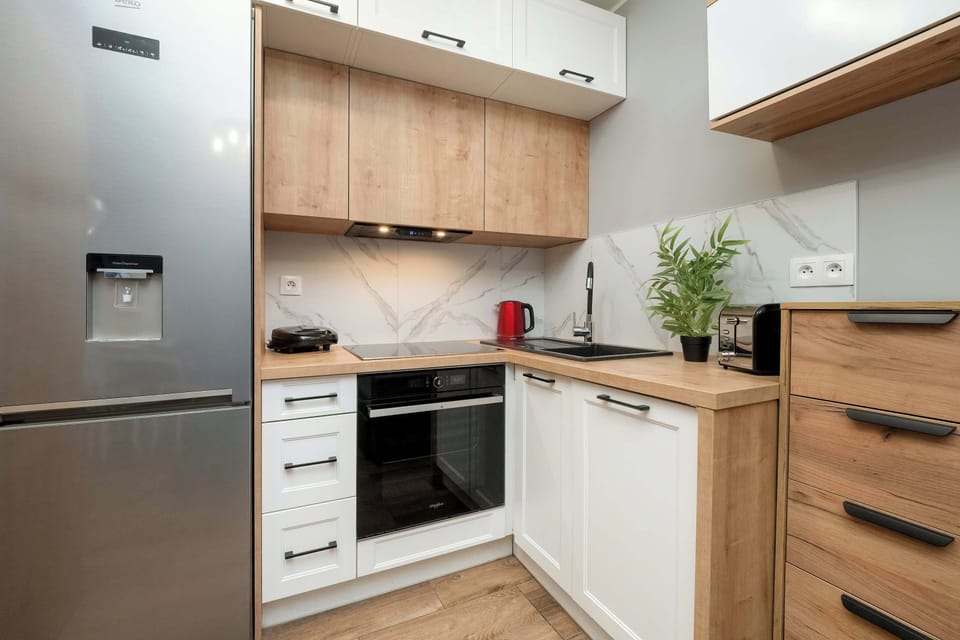 The fully equipped kitchenette includes everything you need for a home-cooked meal.