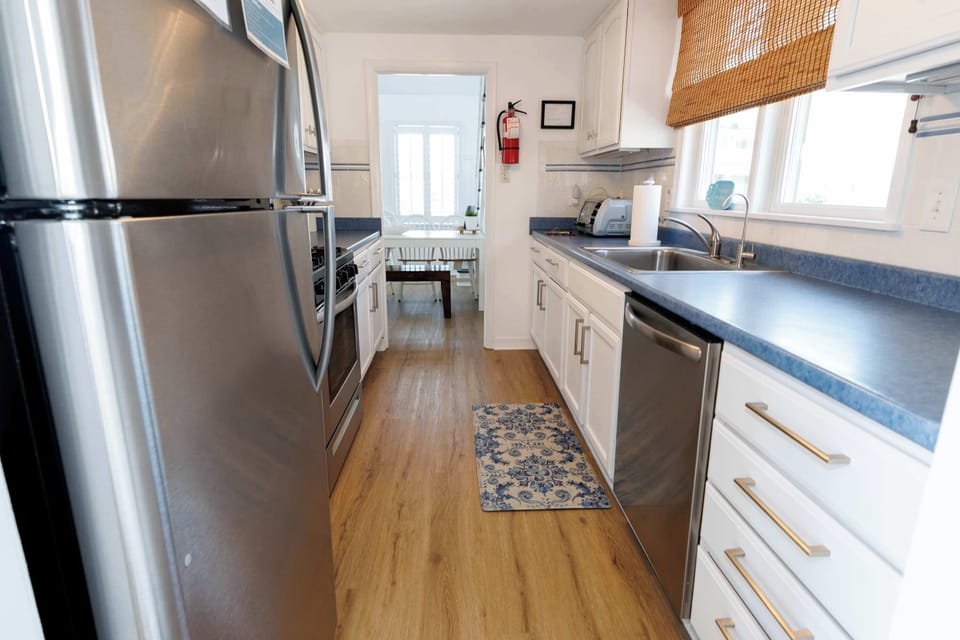 Well-stocked kitchen with modern appliances and everything needed for home-cooked meals.