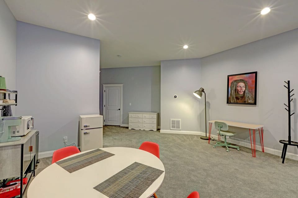 This large space adjoins the entertainment area and connects to the bathroom.