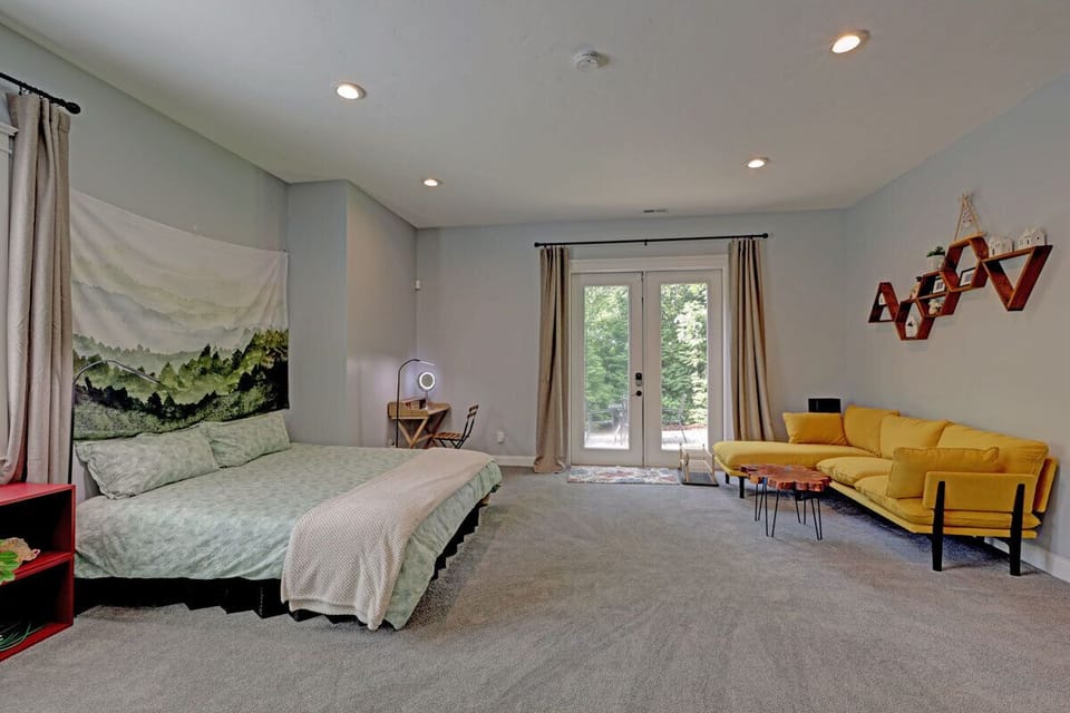 Looking out from inside the unit, this view shows the front door and windows, highlighting the natural light and open feel.