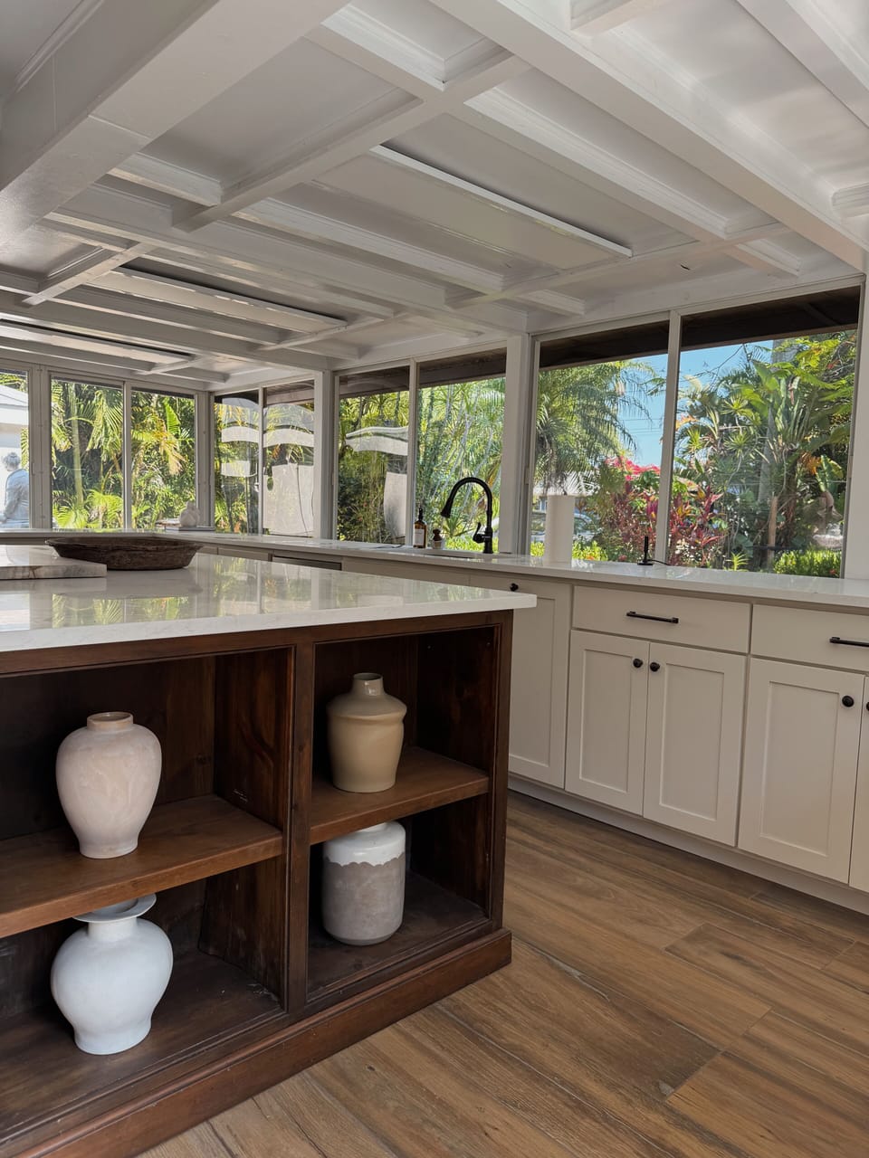 A charming and light filled spacious chef's kitchen to gather and enjoy dining.